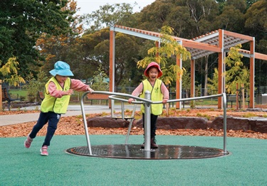 Children playing in Ballam Park play space