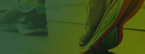 running-shoes-on-treadmill-gradient-green-banner